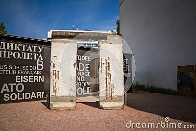 Germany, Piece of the Berlin Wall at the Mauer museum House of Checkpoint Charlie Editorial Stock Photo